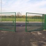 Green Mesh Panel Gate Slightly Open