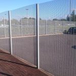 Grey Mesh Panel Fencing Around A Carpark