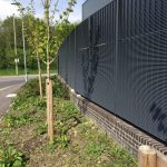 Steel Fencing On Top Of Brick Wall