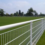 White Steel Spectator Fencing Around Football Pitch