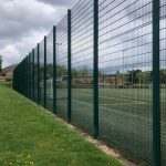 Green Ball Stop Fencing Enclosing Football Field