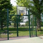 Basketball Hoop Attached To Green Steel Play Area