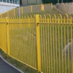 Bowed Yellow Railings For Walkway